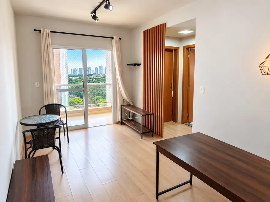 Sala integrada com sacada do apartamento no Lazise Residencial