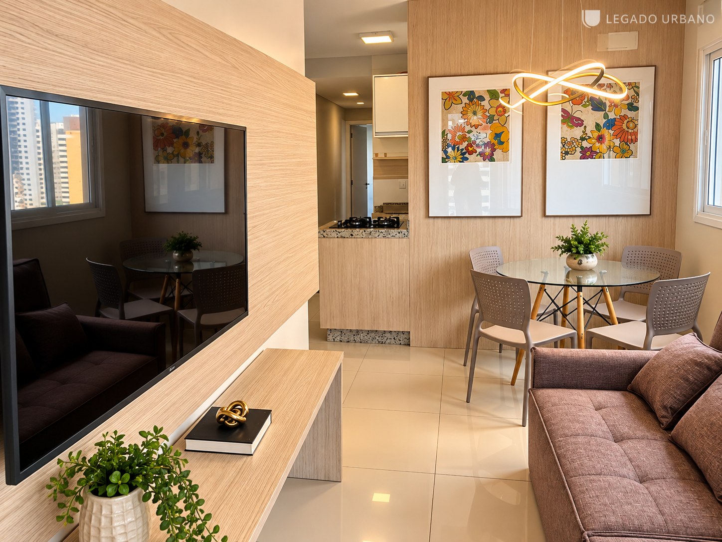 Sala integrada e mobiliada do apartamento Uníque Marechal em Maringá